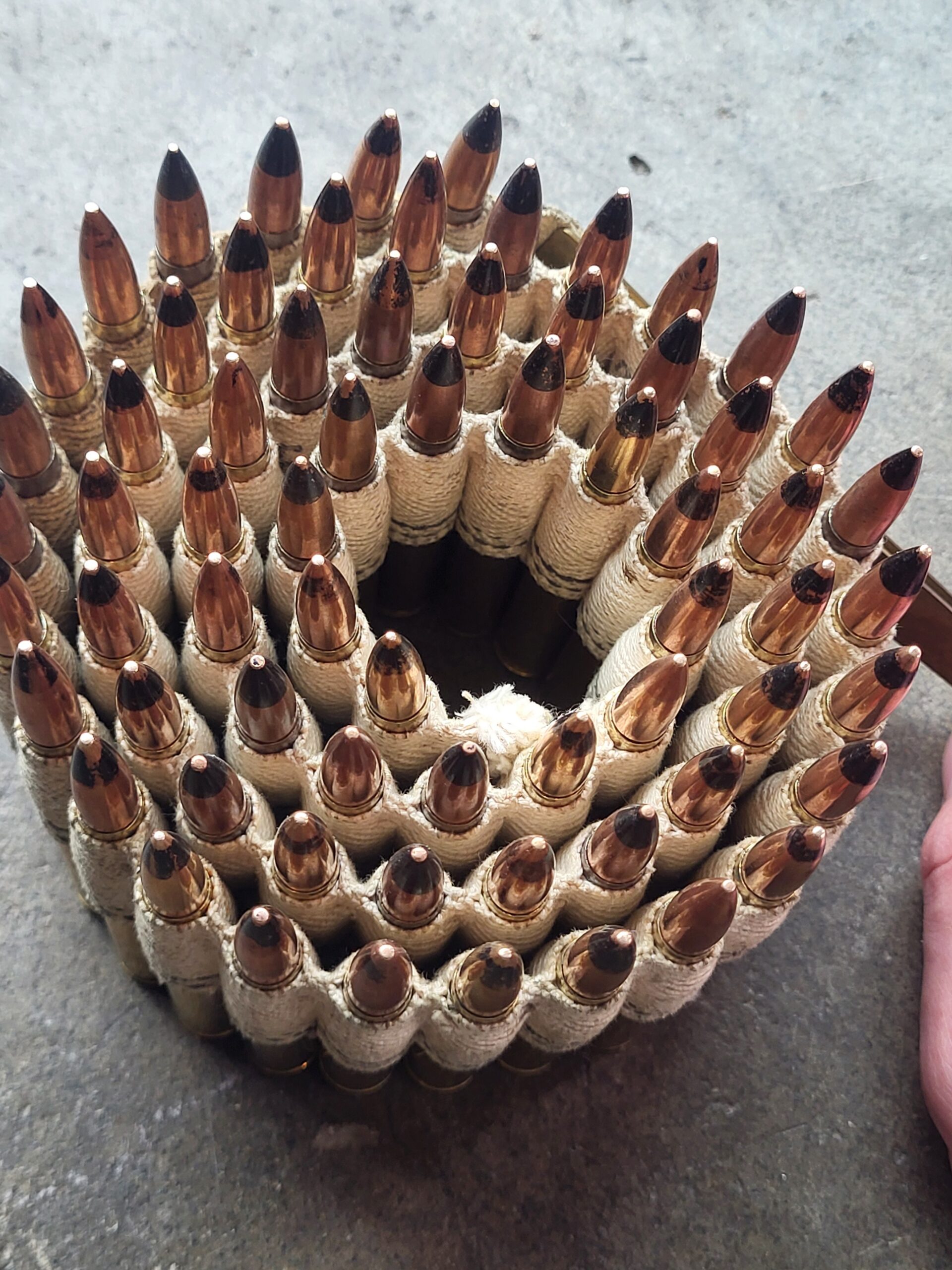 67 rounds of mixed 1940s 30-06 Armor piercing on cloth belt